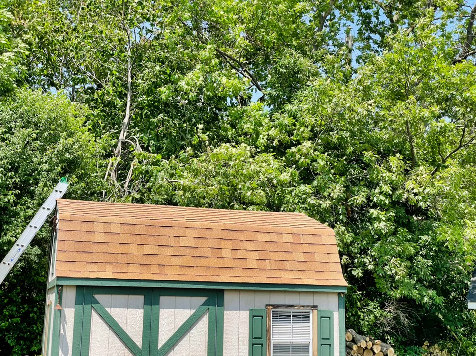 Completed shed roof with new architectural shingles, Wisconsin
