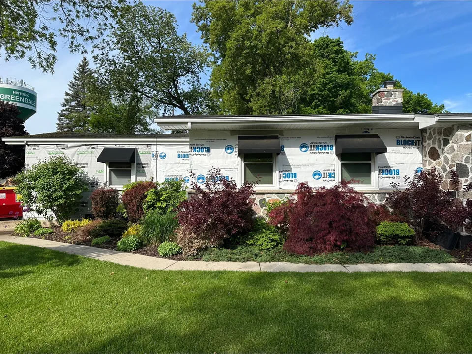 Siding replacement underway with house wrap in historic Greendale, WI